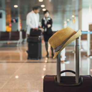 travel-suitcase-in-airport-terminal-2021-10-06-09-50-15-utc